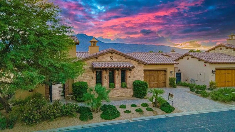 A 4-bed, 4.5-bath, 3608-square-foot home with 12-foot ceilings and panoramic mountain views in La Quinta, CA